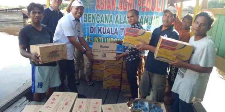 Kepedulian Asian Agri Bantu Korban Banjir di Riau