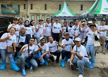 Pegadaian Medan Bersih-bersih Sampah Sungai Deli
